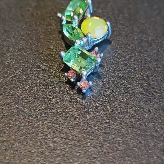 Uranium Glass Pendant in new Sterling Silver abstract design with multiple vintage Uranium glass stones that glows under black / UV light