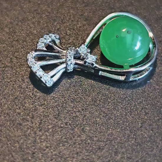 Uranium Glass pendant, new Sterling Silver with a vintage rare dark Green Round top Uranium glass stone that glows under black light