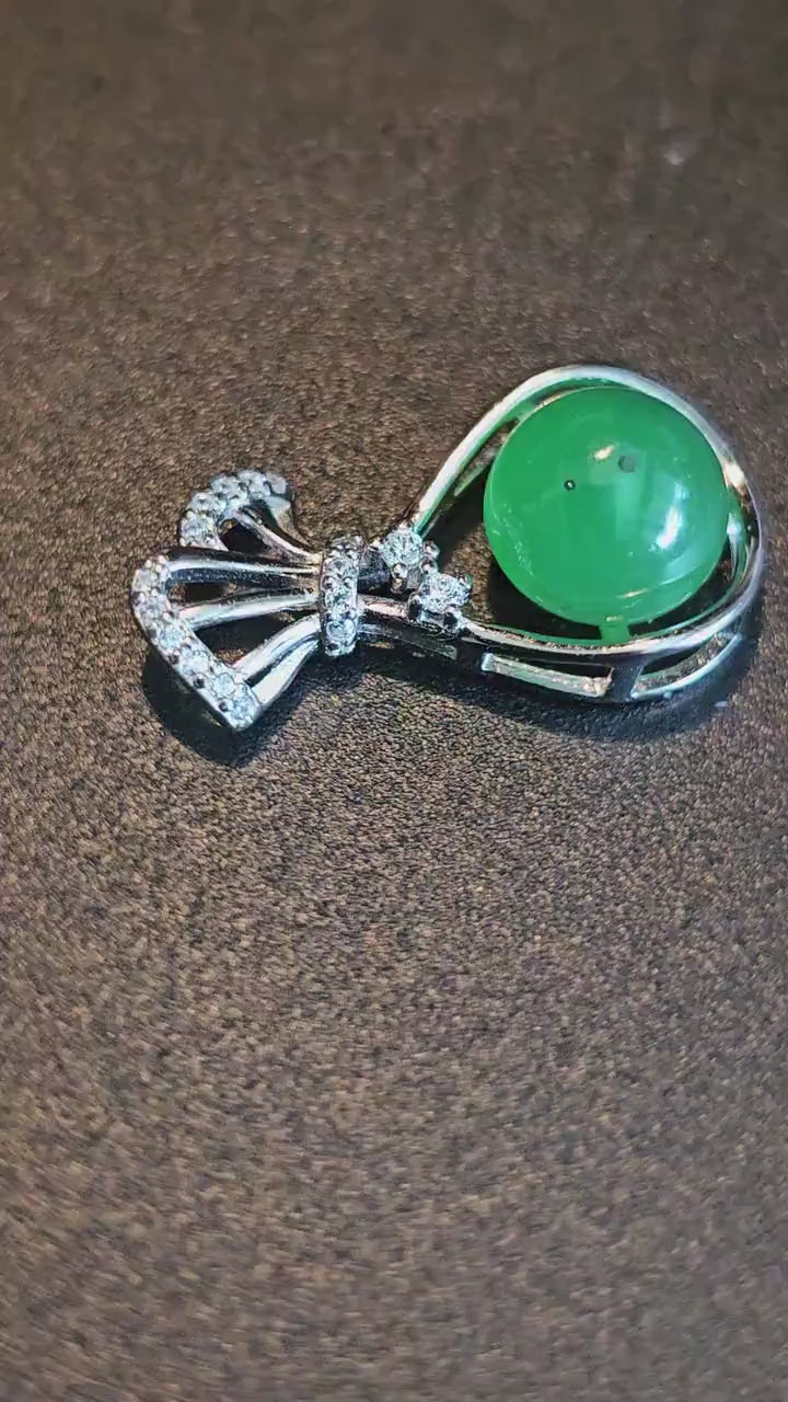 Uranium Glass pendant, new Sterling Silver with a vintage rare dark Green Round top Uranium glass stone that glows under black light