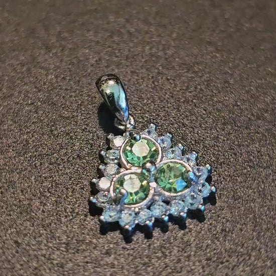 Uranium Glass Pendant new Sterling Silver with three vintage Round cut 4 mm vintage Uranium Glass stones glows under black / UV light