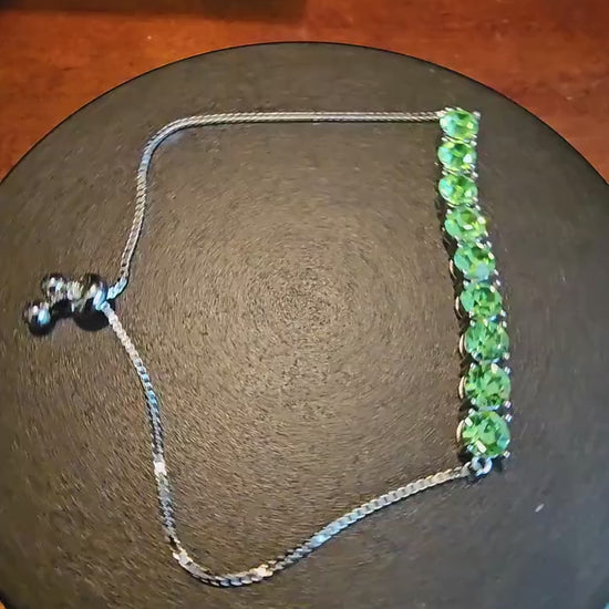 Uranium Glass Bracelet new Sterling Silver with 9 vintage Uranium glass Round cut stones in 6 mm that glow under black / UV light.