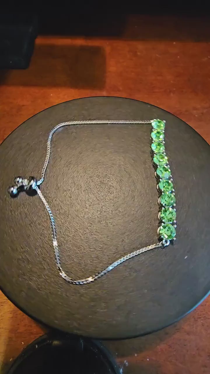 Uranium Glass Bracelet new Sterling Silver with 9 vintage Uranium glass Round cut stones in 6 mm that glow under black / UV light.