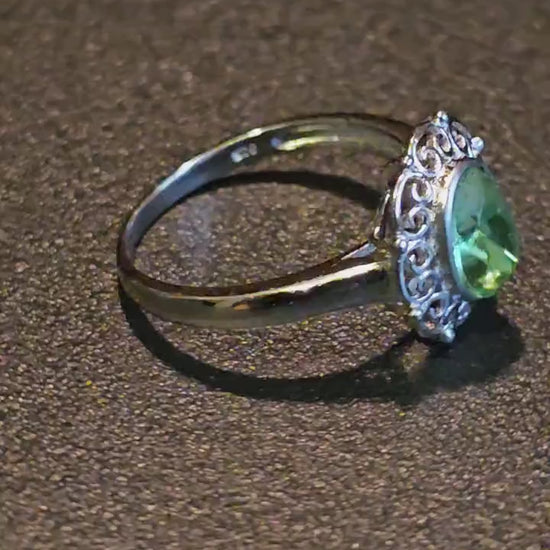 Uranium Glass Oval cut Ring Filigree style size 7, new Sterling Silver with a vintage Uranium glass stone that glows under black / UV light