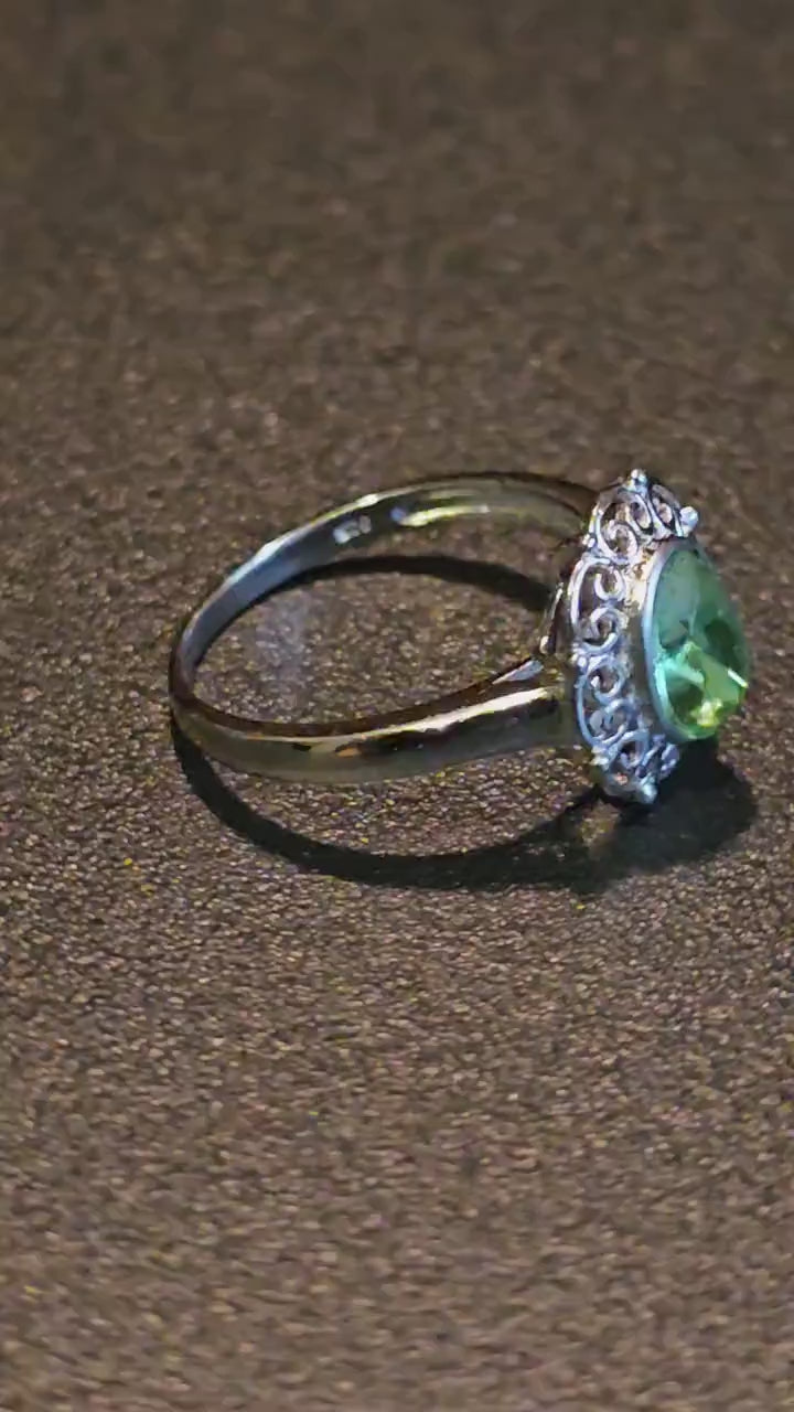 Uranium Glass Oval cut Ring Filigree style size 7, new Sterling Silver with a vintage Uranium glass stone that glows under black / UV light